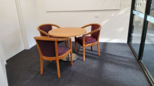 Small library room CLS 4 with a round table and three chairs
