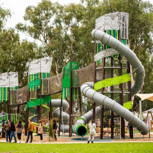 The interconnected playground equipment at the Riverside is green and grey, and reminiscent of Wagga's Water Whizz.