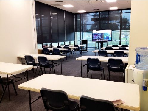 Library room CLS 1&2 in a classroom layout with interactive board
