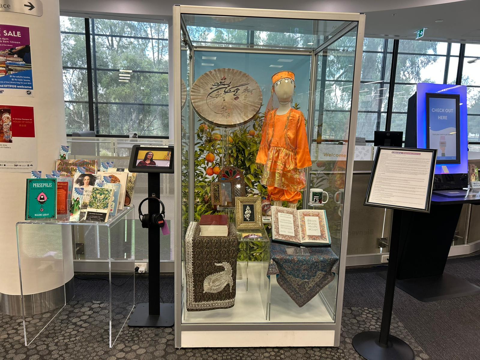A photo of the 2026 Library Connections Display that features Shokoofeh and her family.
