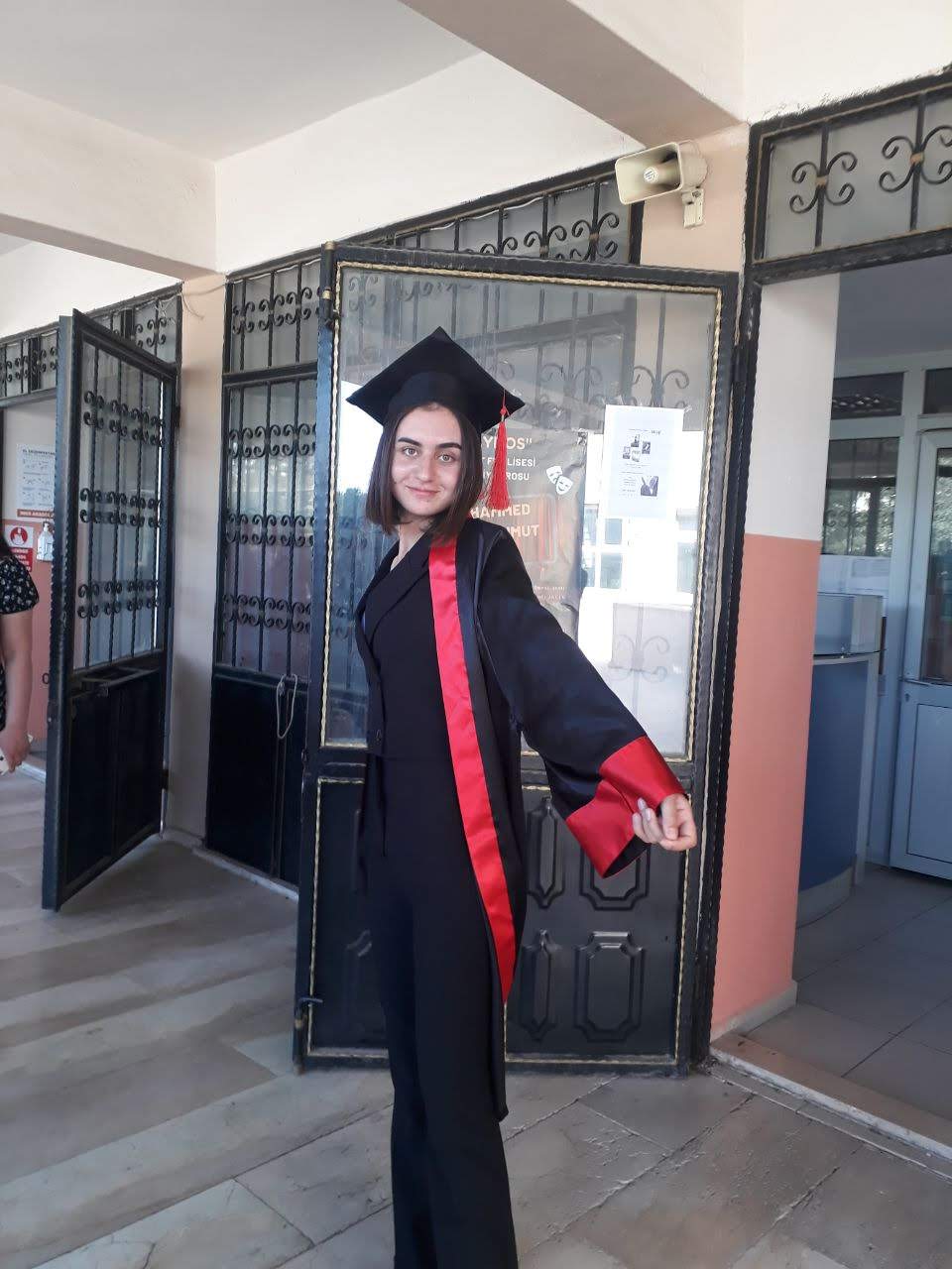 Photo of Dalal in her graduation robes.