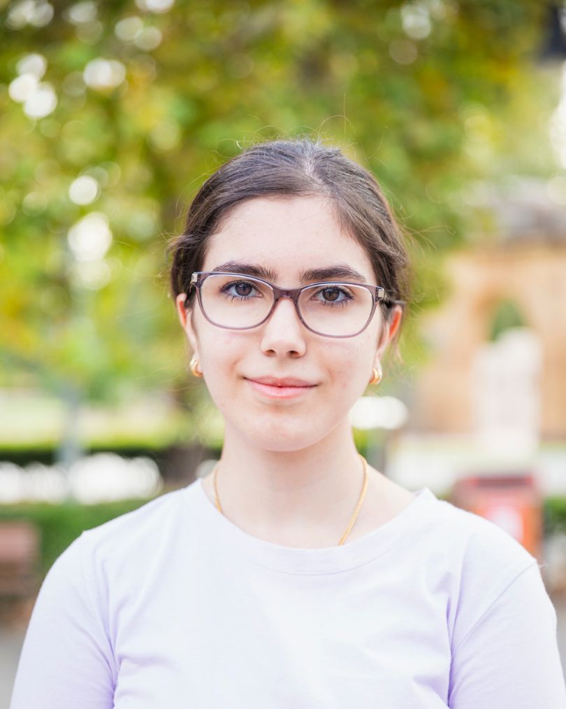 Photo of Golnoush smiling outside the Library.